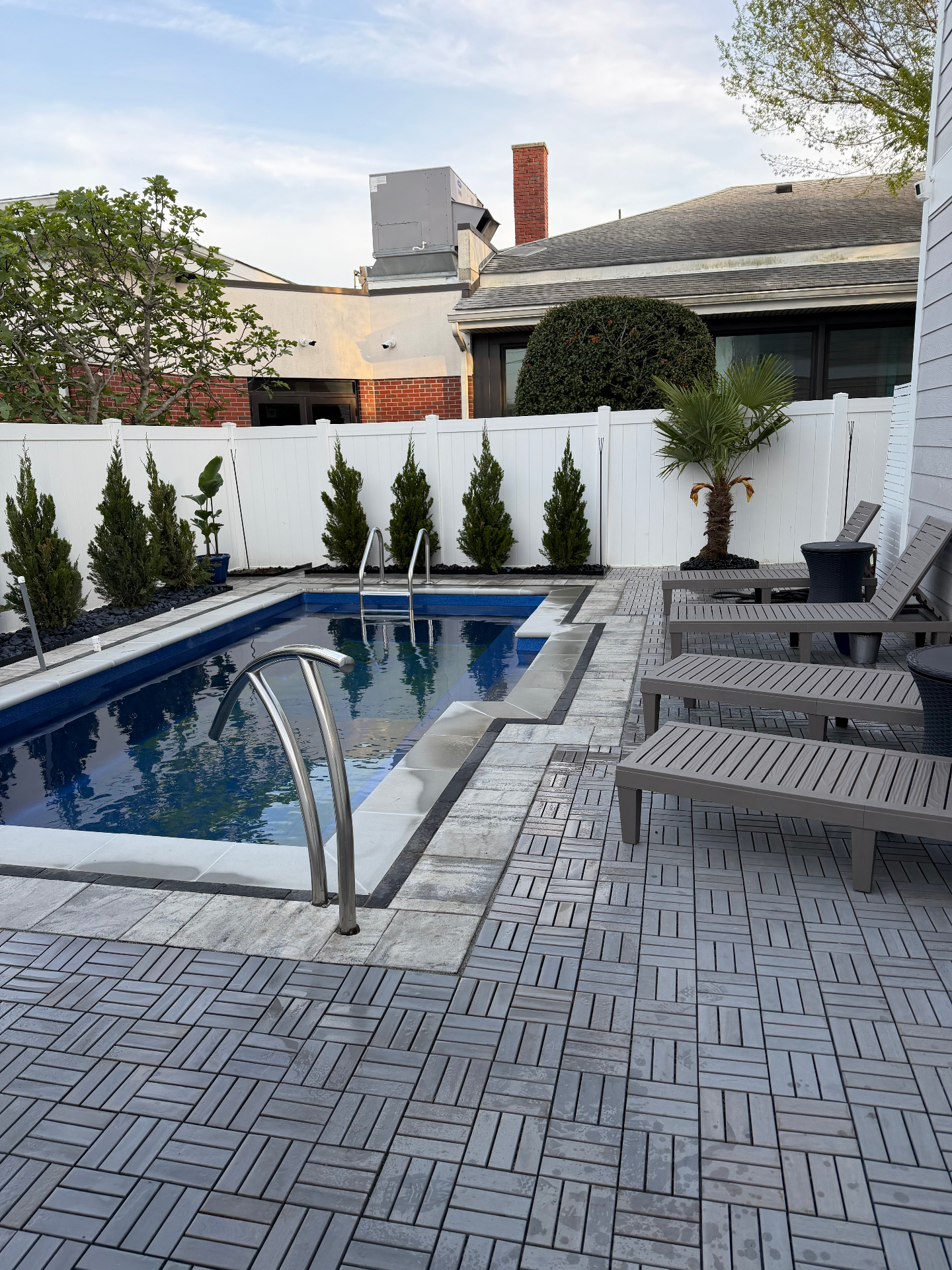 Paver patio and pool installation by Zero Trace in Virginia Beach